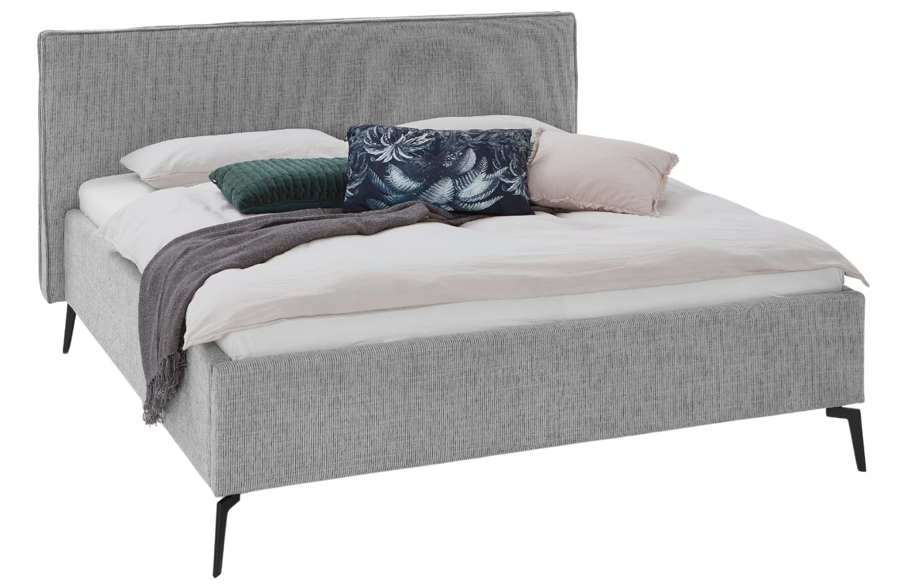 Světle šedá čalouněná dvoulůžková postel Meise Möbel Riva 180 x 200 cm s úložným prostorem
